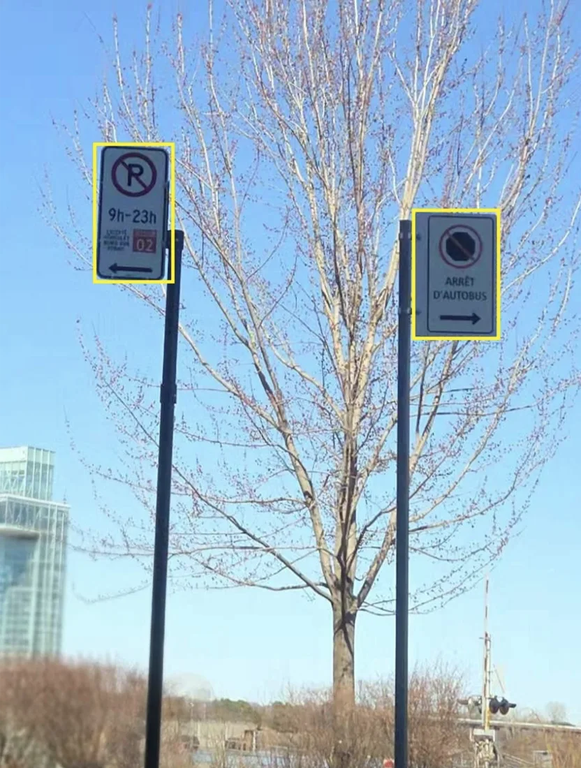 Application Vigilia : deux panneaux de signalisation détectés et encadrés automatiquement depuis un véhicule — interdiction de stationner de 9 h à 23 h et zone d'arrêt d'autobus
